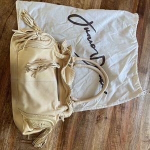 Italian leather Junior Drake purse. Ivory with tassels. New condition.